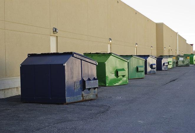 construction dumpsters stacked in a row on a job site in Eddystone, PA